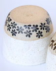 Handmade cup with flower motifs made in Byron Bay