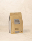 Bag of Nero Espresso coffee with honeycomb and hazelnut aroma