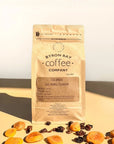 Byron Bay Coffee Company coffee package with dried fruits on a light background