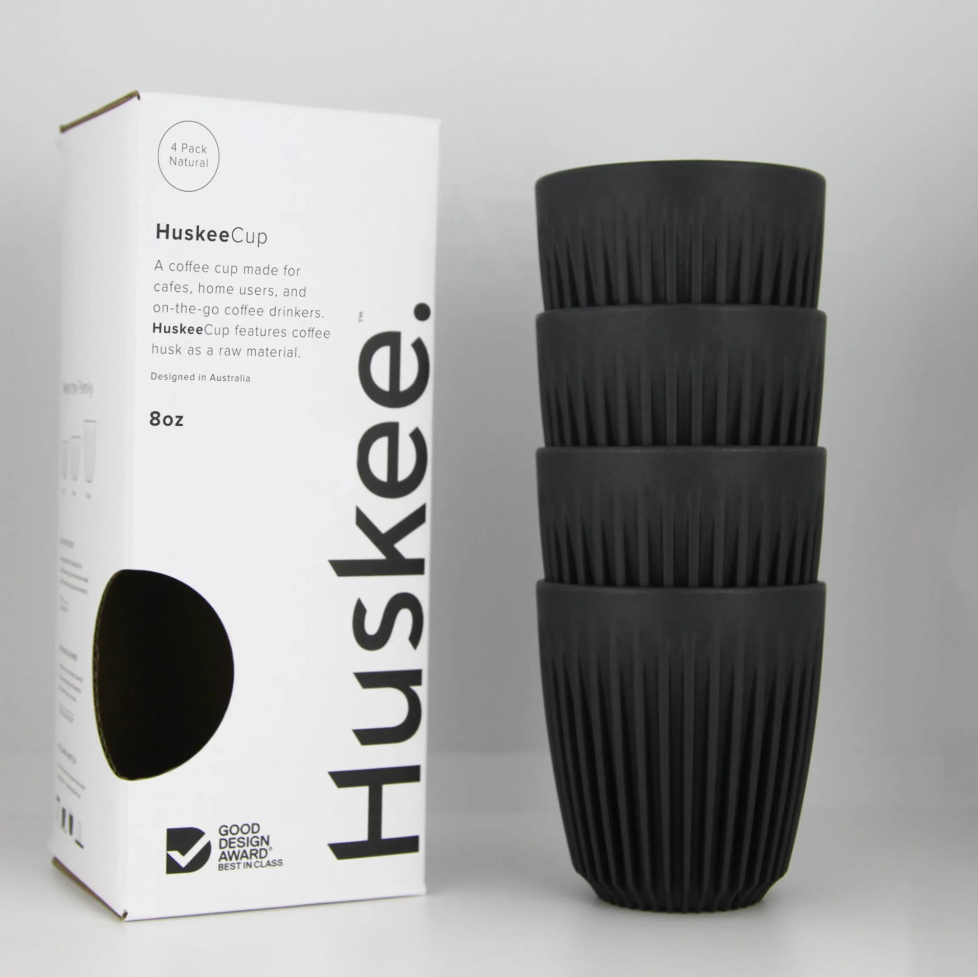 Stack of 4 charcoal coloured Huskee reusable cups