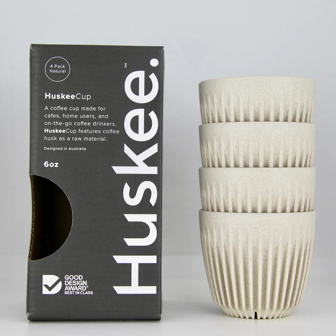 Stack of 4 Natural Huskee Cups with black packaging