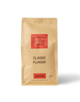Bag of Classic Plunger coffee with dark chocolate, cinnamon, and brown sugar notes.
