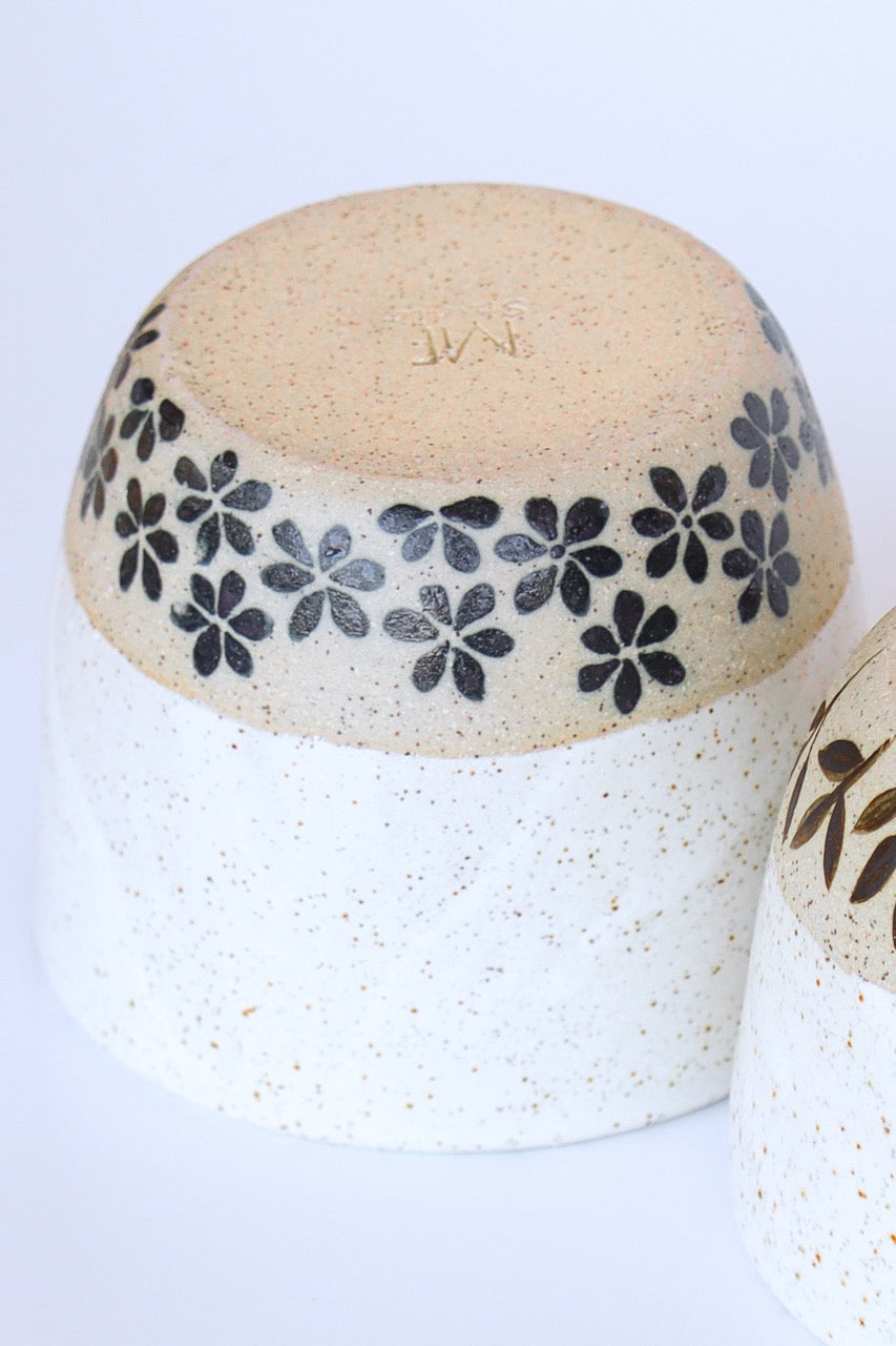 Handmade cup with flower motifs made in Byron Bay
