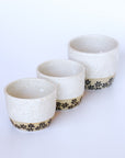 Handmade cup with flower motifs made in Byron Bay