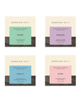 Four Byron Bay Tea Co. tea bags with different flavors on a white background