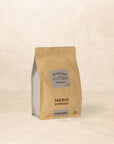 Bag of Nero Espresso coffee with honeycomb and hazelnut aroma