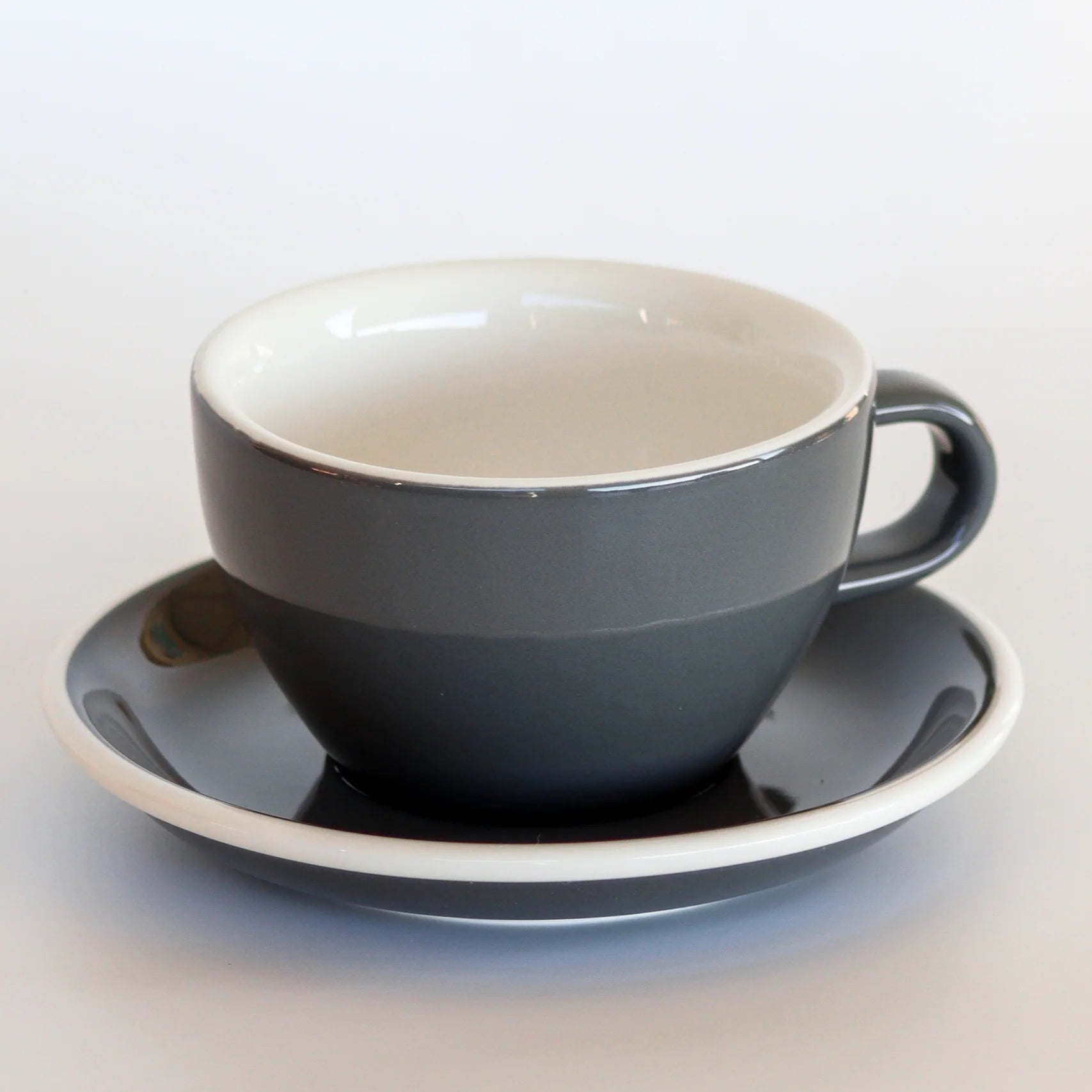 Grey coffee cup and saucer