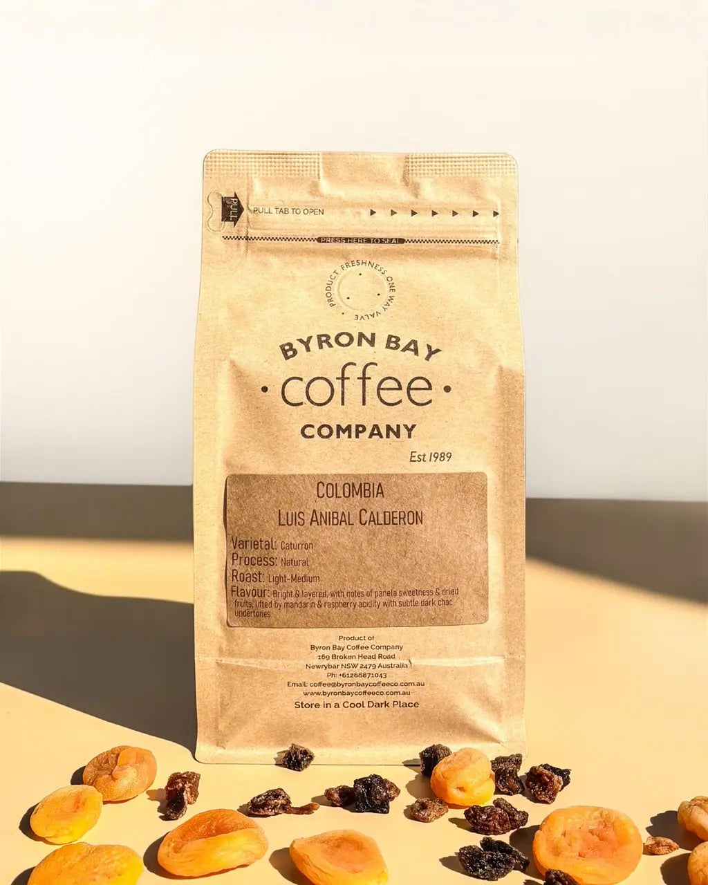 Byron Bay Coffee Company coffee package with dried fruits on a light background